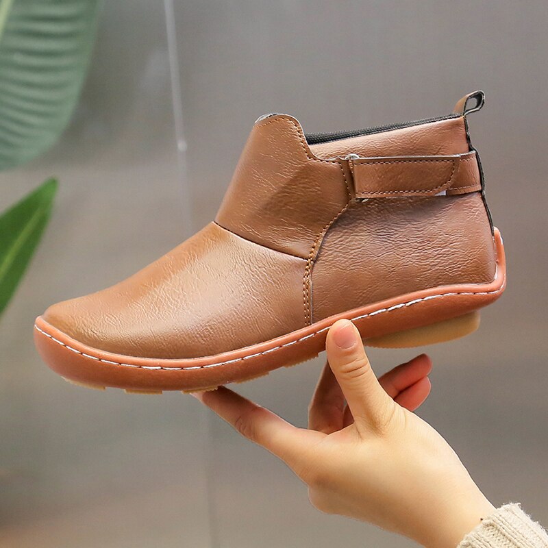Kathie | Women's Adjustable Strap Round Toe Slip On Boots